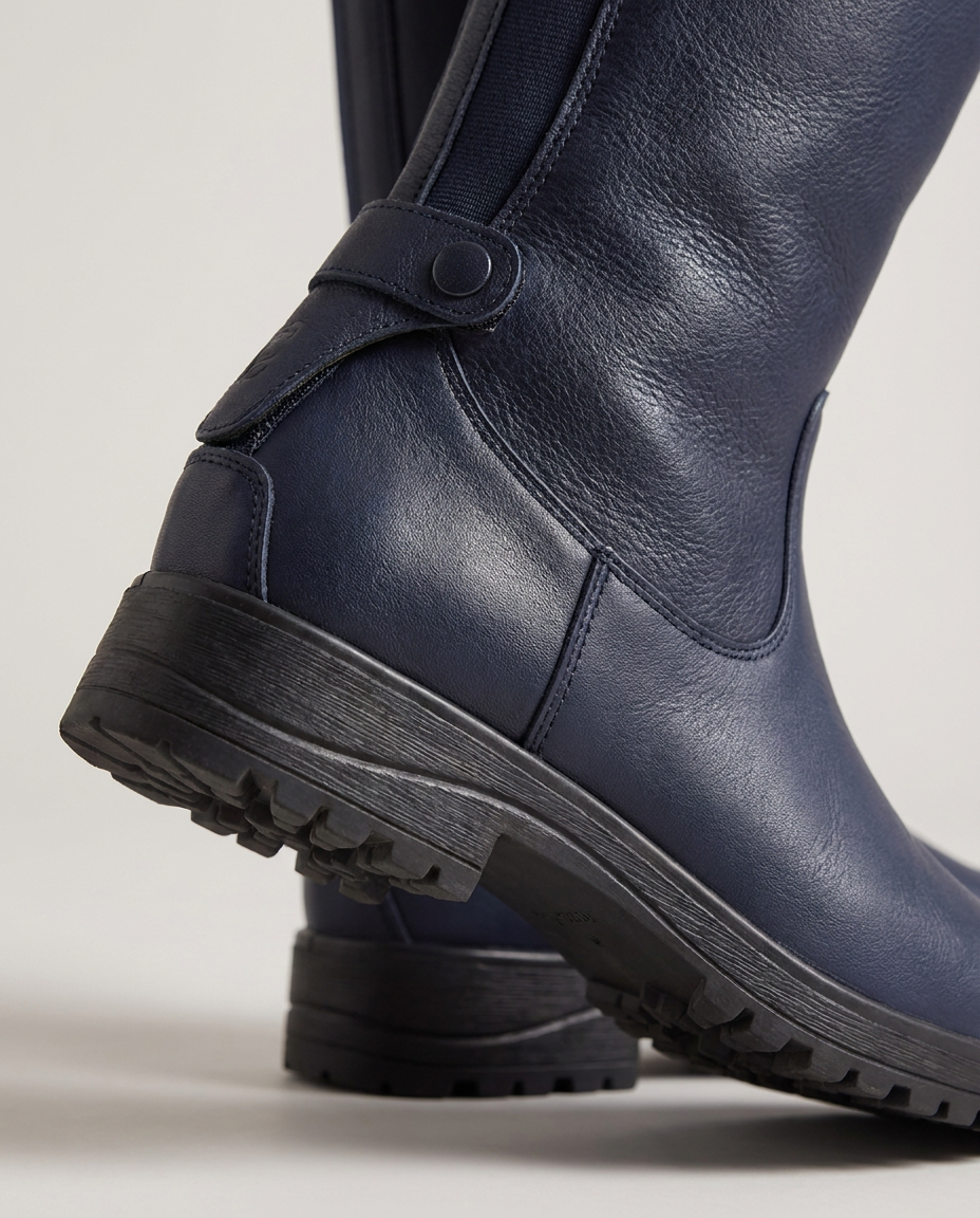 Waterproof Knee-High Boots with Buckle Strap - close-up of the material and detail