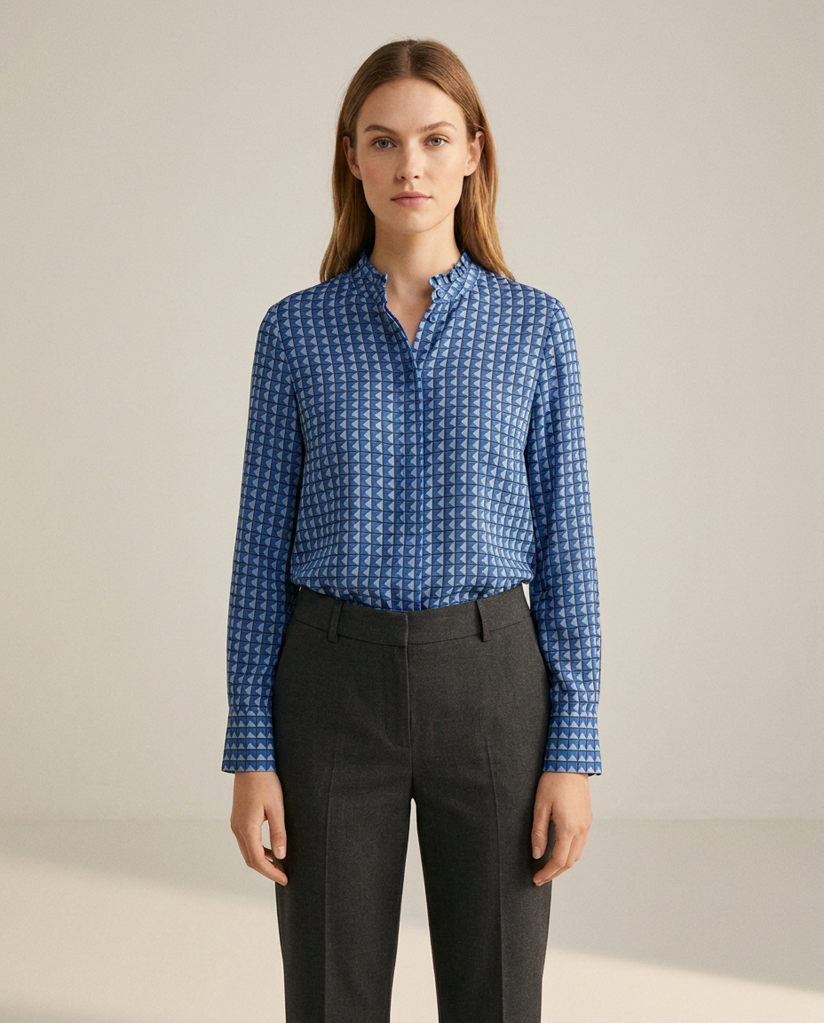 Blue geometric print blouse with ruffle collar