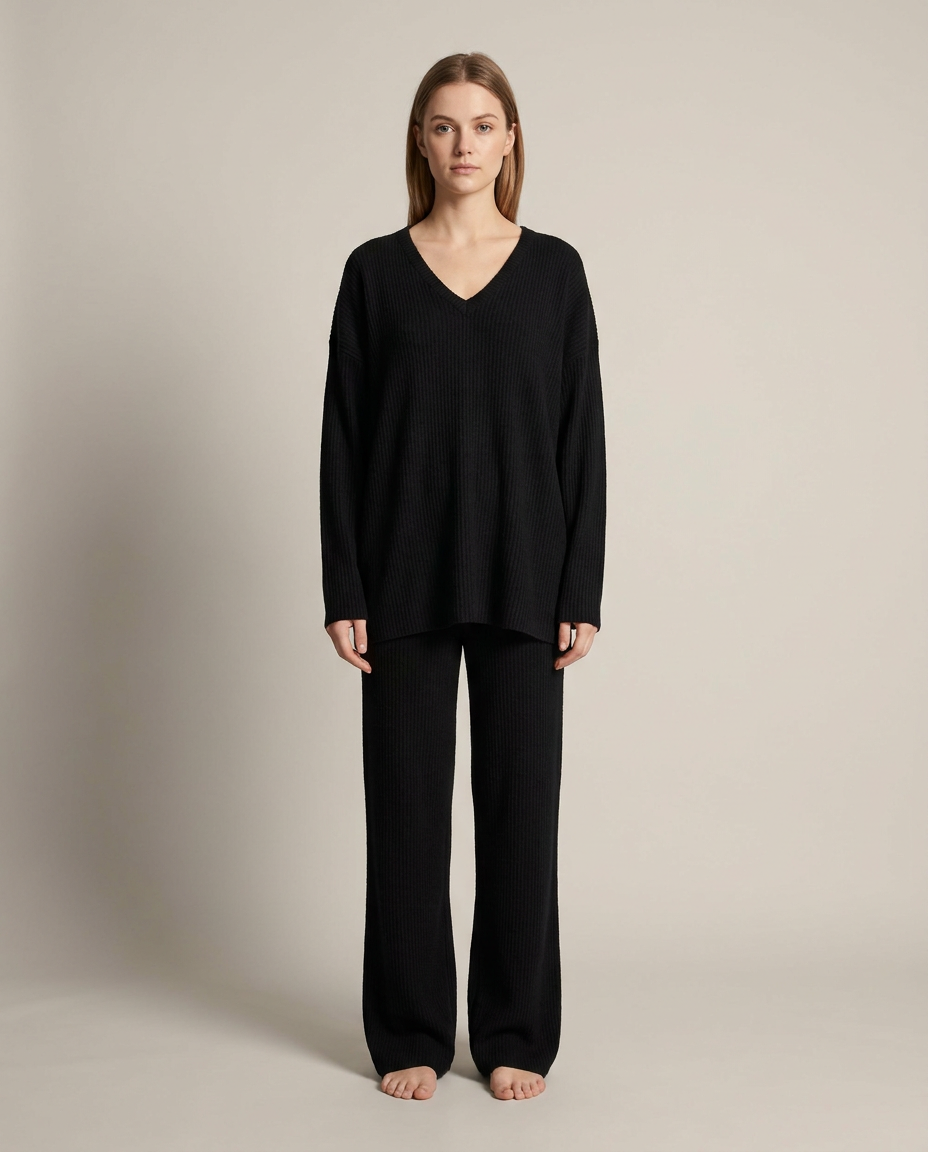 Black ribbed knit V-neck top and wide-leg trousers set